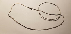 Flat necklace and twisted bracelet are old pieces