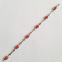 Old silver art deco bracelet with red stones