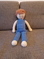 Knitted baby with blue bridle pants