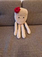 Cream colored knitted octopus baby