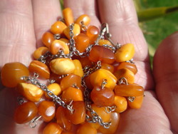 A handful of lemon yellow 100% natural amber necklaces can be used in 2 rows
