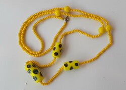 Vintage long string of yellow glass beads