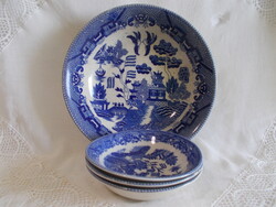 Antique faience bowl with three small bowls