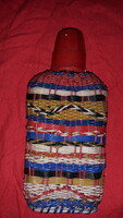 Retro 1970s 2 dl capacity colored wire braided flat pocket bottle as shown in the pictures