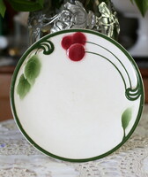 Majolica plate in art deco style with cherry decor