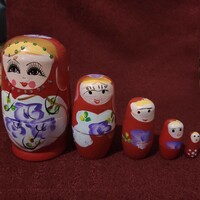 5-piece wooden doll toy resembling Matryoshka dolls