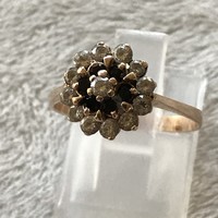 Gold ring with gemstones