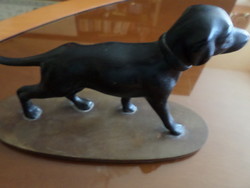 Black dog carved from wood