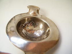 Old marked silver-plated tea strainer
