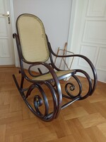 Rocking chair with newspaper reader