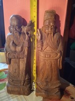 Carved wooden sculptures together