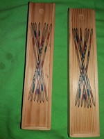 Retro wooden mikado skill game with sticks in a wooden box, unplayed according to the pictures