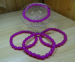 Bracelet made of cyclamen colored glass beads, high gloss.