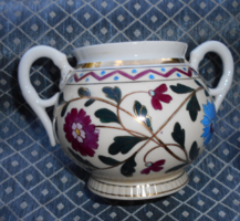 Antique hand-painted bowl with golden contour