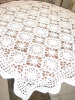 Beautiful hand-crocheted lace tablecloth with antique art nouveau features