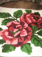 Pink cushion base sewn with beautiful cross-stitch embroidery