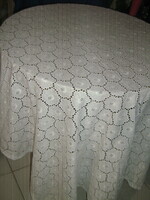 Beautiful and elegant madeira tablecloth with filigree floral embroidery
