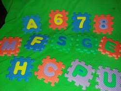 Retro sponge puzzle pieces with many letters to fill gaps as shown in the pictures