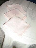 A beautiful rose-patterned pink damask tablecloth with 3 napkins