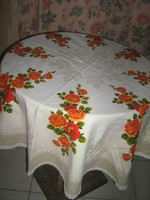 Beautiful vintage-style round tablecloth with floral edges