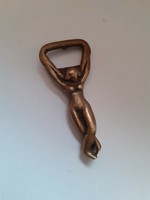 Old brass woman shaped beer drink opener
