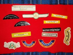 12 old and antique liquor neck labels in one - condition according to the pictures