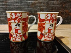 Pair of Santa Claus snowman mugs