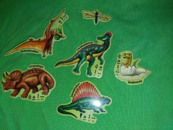 Retro-trafficked dinosaur fridge magnets in a package as shown in the pictures
