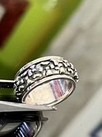A special silver ring with a rotating center
