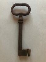 Old large wrought iron cellar key. Size: 17x6.5 cm