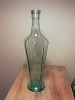 Blue-green glass bottle