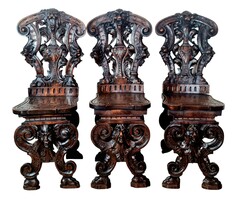A701 Antique, richly carved Italian Renaissance style chairs