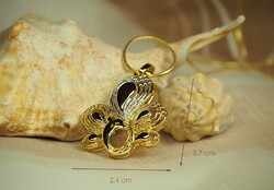 Gold-colored fashion jewelry (goldfilled) necklace with peacock pendant