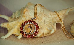 Gold-colored fashion necklace (goldfilled) with peacock pendant