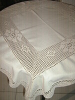 Beautiful hand-crocheted floral ecru tablecloth with inset and crocheted edges