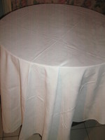 Beautiful antique white damask tablecloth with large flowers