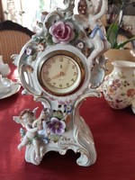 Antique fine porcelain table clock, beautiful, flawless, mechanical, working with Arabic numerals.