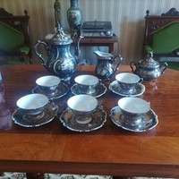 Silver plated porcelain coffee set.