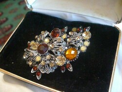 Beautiful antique brooch with many stones