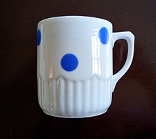 Blue polka dot mug with a wavy skirt
