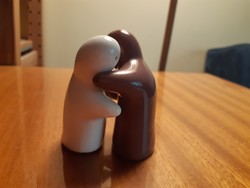 Art ceramic salt and pepper shaker depicting hugging figures