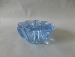 Flower-shaped blue glass candle holder