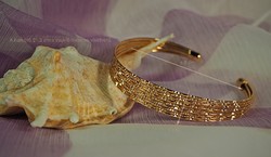 Gold-colored (goldfilled) rigid bracelet