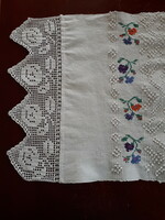 Transylvanian embossed house linen with cross-stitch embroidered running lace ends