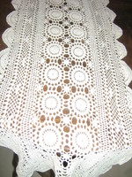 Beautiful hand-crocheted white tablecloth with Art Nouveau features
