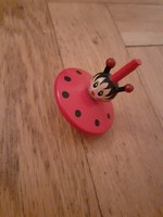 Red black wood spinner ladybug pattern is almost miraculous
