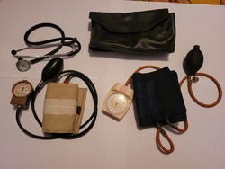 2 old blood pressure monitors with stethoscopes