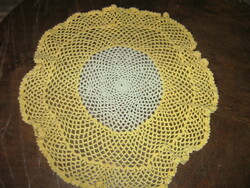 Beautiful antique handmade crocheted round tablecloth with wavy edges