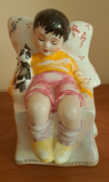 Porcelain sleeping child with a cat