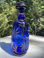 Cobalt blue hand-painted, gilded liquor bottle with glass stopper